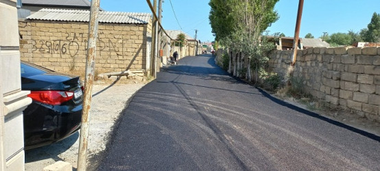 Binəqədi rayonunda Tədbirlər Planına uyğun olaraq mərhələli şəkildə asfaltlama işləri davam etdirilir.