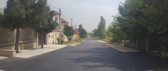 Biləcəri qəsəbəsi şəhid Nihat Rzaxanov küçəsinə asfalt örtüyünün çəkilməsi işləri başa çatdı